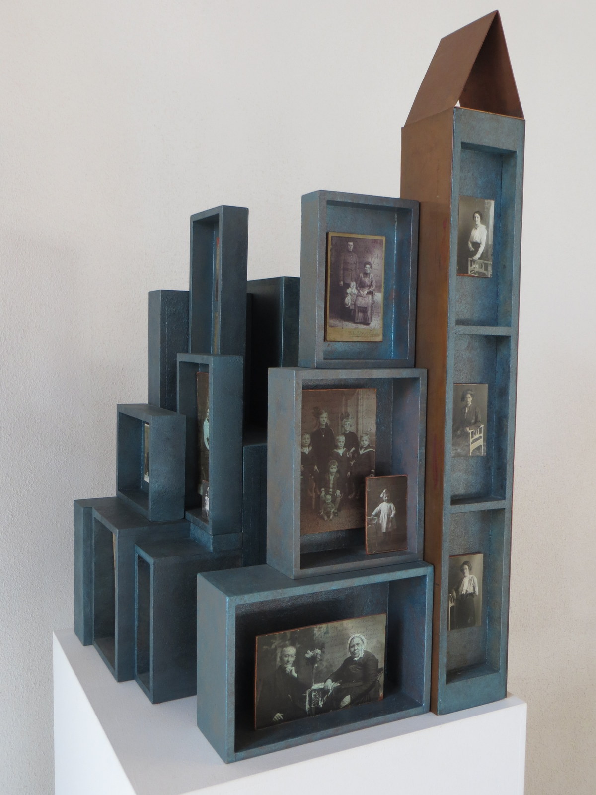 2012<br>40 x 40 x 68 cm<br>photographs, mdf, copper